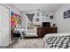 Bedroom with a bed, dresser, and desk at 304 Slaughter Rd, Hampton, GA 30228