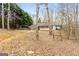 House with screened porch and wooded backyard at 304 Slaughter Rd, Hampton, GA 30228