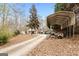Home with carport and long driveway at 304 Slaughter Rd, Hampton, GA 30228