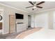 Spacious bedroom offering ample closet space and modern fixtures, including a TV at 12 Independence Nw Pl # 12, Atlanta, GA 30318