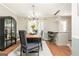 Elegant dining room with hardwood floors, stylish decor, and modern lighting at 12 Independence Nw Pl # 12, Atlanta, GA 30318