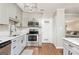 Bright and modern kitchen featuring stainless steel appliances and eat in breakfast area at 12 Independence Nw Pl # 12, Atlanta, GA 30318
