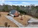 Aerial view of house, driveway, and landscaping at 55 Clearbrook Ct, Covington, GA 30016