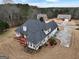 House with deck and large backyard, next to other homes at 55 Clearbrook Ct, Covington, GA 30016