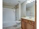 Full bathroom with shower/tub combo and wood vanity at 55 Clearbrook Ct, Covington, GA 30016