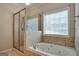 Bathroom with shower and jetted tub at 55 Clearbrook Ct, Covington, GA 30016
