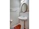 Powder room with pedestal sink and tile at 55 Clearbrook Ct, Covington, GA 30016