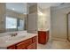 Double vanity bathroom with wood cabinets at 55 Clearbrook Ct, Covington, GA 30016