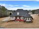 House with deck, landscaping, and large backyard at 55 Clearbrook Ct, Covington, GA 30016