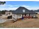 House with deck and attached garage, in a neighborhood setting at 55 Clearbrook Ct, Covington, GA 30016