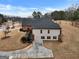 House with attached garage and landscaping at 55 Clearbrook Ct, Covington, GA 30016