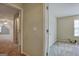 View down a hallway showing two bedrooms at 55 Clearbrook Ct, Covington, GA 30016