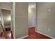 Upper level hallway with hardwood floors at 55 Clearbrook Ct, Covington, GA 30016