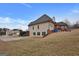 House exterior showcasing side yard and landscaping at 55 Clearbrook Ct, Covington, GA 30016
