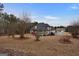 House exterior showcasing landscaping and backyard at 55 Clearbrook Ct, Covington, GA 30016