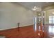 Hardwood floor living room with high ceilings and lots of light at 55 Clearbrook Ct, Covington, GA 30016