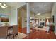 Spacious living room with hardwood floors, fireplace, and large windows at 55 Clearbrook Ct, Covington, GA 30016