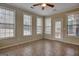 Sunroom with tile floors and backyard access at 55 Clearbrook Ct, Covington, GA 30016