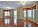 Sunroom with hardwood floors and lots of natural light at 55 Clearbrook Ct, Covington, GA 30016