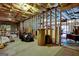 Unfinished basement area with high ceilings and potential at 55 Clearbrook Ct, Covington, GA 30016