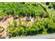Aerial view of a home in wooded area near road at 90 Ayers Rd, Bowdon, GA 30108