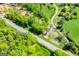 Aerial view of wooded property including a road at 90 Ayers Rd, Bowdon, GA 30108