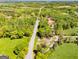 Aerial view of a road and wooded home site at 90 Ayers Rd, Bowdon, GA 30108