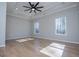 Spacious bedroom boasts tray ceilings, recessed lighting, and large windows at 90 Ayers Rd, Bowdon, GA 30108