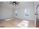 Bright and airy bedroom with tray ceilings and natural light from large windows at 90 Ayers Rd, Bowdon, GA 30108