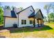 Exterior side view showcasing siding and gutters of the house at 90 Ayers Rd, Bowdon, GA 30108