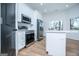 Modern kitchen featuring stainless steel appliances and a large island at 90 Ayers Rd, Bowdon, GA 30108