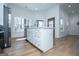 Contemporary kitchen island with stainless steel dishwasher and gold handles at 90 Ayers Rd, Bowdon, GA 30108