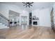 Bright living room with hardwood floors, a modern fireplace, and an open layout great for entertaining at 90 Ayers Rd, Bowdon, GA 30108