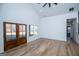 Bright living room with high ceilings, natural light, and beautiful wood floors, creating a welcoming space at 90 Ayers Rd, Bowdon, GA 30108