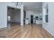 Spacious living room view into kitchen area. Perfect for modern living and gatherings at 90 Ayers Rd, Bowdon, GA 30108