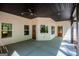 Spacious, covered patio with ceiling and recessed lighting at 90 Ayers Rd, Bowdon, GA 30108
