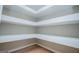 Unique shelving with ledge design and wood floors at 90 Ayers Rd, Bowdon, GA 30108