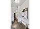 Hallway with hardwood floors, leading to other rooms at 147 Hubbard Rd, Woodstock, GA 30188