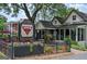 Exterior of Ipp's Pastaria and Bar, showcasing its inviting outdoor seating and charming architectural details at 147 Hubbard Rd, Woodstock, GA 30188