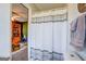 Simple bathroom with shower and toilet at 463 Conyers Rd, Mcdonough, GA 30253