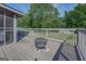 Spacious deck with fire pit and backyard view at 463 Conyers Rd, Mcdonough, GA 30253
