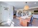 Open concept dining area with view into kitchen and living room at 463 Conyers Rd, Mcdonough, GA 30253