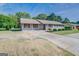 Ranch home with carport and spacious yard at 463 Conyers Rd, Mcdonough, GA 30253