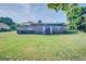 Ranch-style home with deck and screened porch at 463 Conyers Rd, Mcdonough, GA 30253