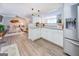 Open concept kitchen with granite counters and stainless steel appliances at 463 Conyers Rd, Mcdonough, GA 30253