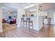 Modern kitchen with breakfast bar and granite countertops at 463 Conyers Rd, Mcdonough, GA 30253