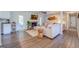Cozy living room with a brick fireplace and ample seating at 463 Conyers Rd, Mcdonough, GA 30253