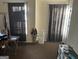 Cozy bedroom with ample natural light filtering through the windows at 20 Sw Pine Canyon Sw Dr, Atlanta, GA 30331