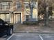 Inviting townhouse featuring a mix of brick and siding with well-maintained landscaping at 20 Sw Pine Canyon Sw Dr, Atlanta, GA 30331