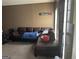 Comfortable living room with a cozy sofa and natural light at 20 Sw Pine Canyon Sw Dr, Atlanta, GA 30331